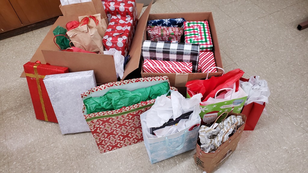 The Interact Rotary Club at school sponsored a family with four children. They donated many gifts that will make some little children very happy!