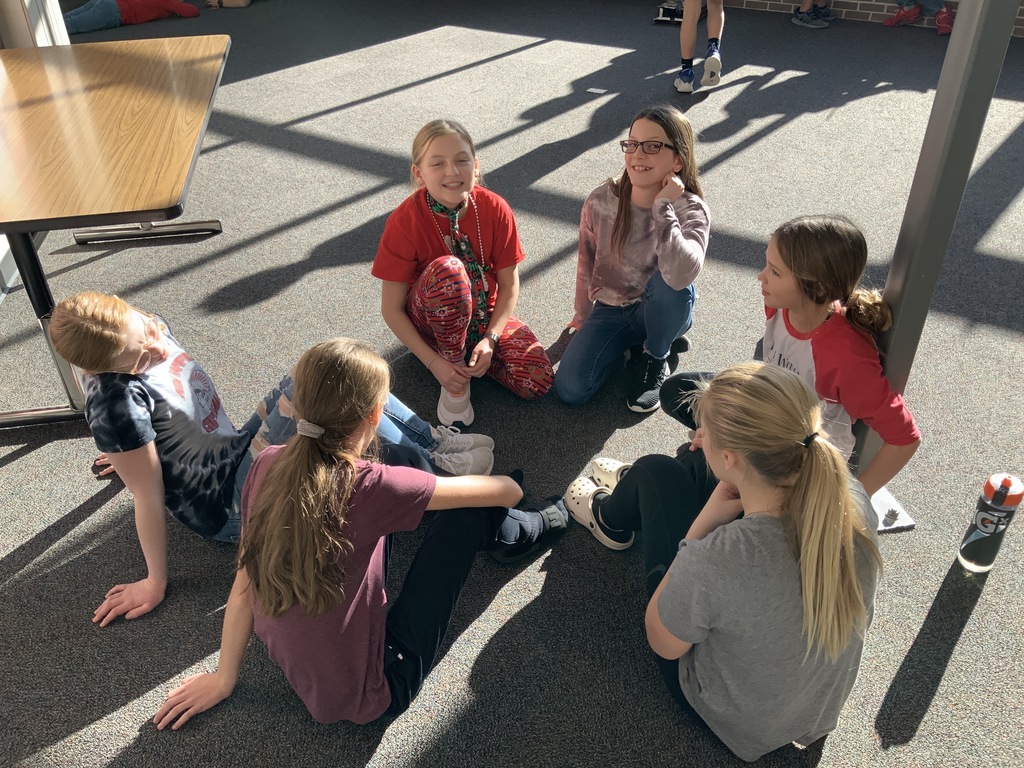5th and 6th graders playing games in the foyer during outfly today