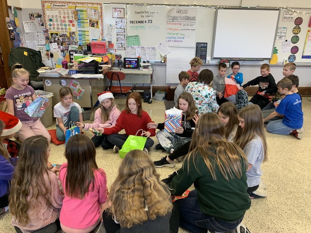 the kids in Miss Ross’ room had a great time with their gift exchange and listening to a story for LEFT, RIGHT, and ACROSS!