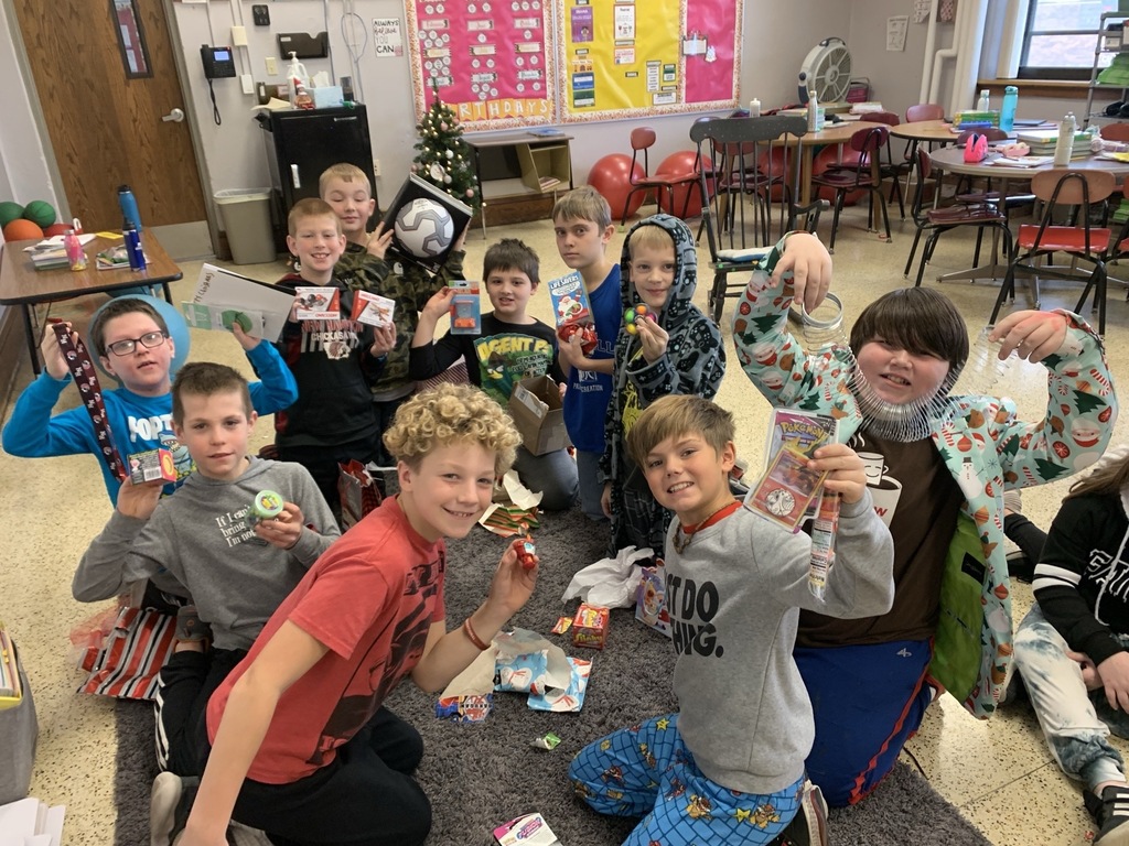 the kids in Miss Ross’ room had a great time with their gift exchange and listening to a story for LEFT, RIGHT, and ACROSS!