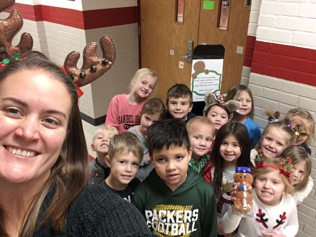  Mrs. K's preschoolers made gingerbread cookies Monday, but they got loose in the school! Today we followed their clues and finally found them in our classroom!  They were delicious!