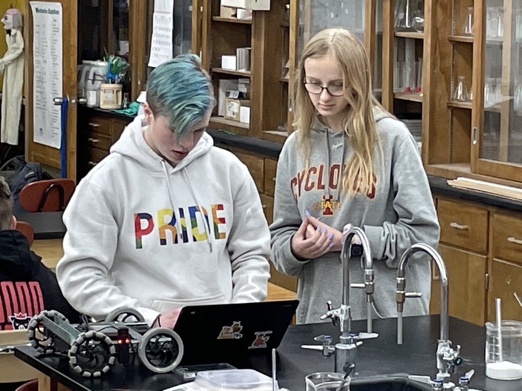 Students in Mr. Pemble's Advanced Chemistry class performing a separation and  qualitative determination of cations in a solution.  They will use this information to then identify the compounds in a solution containing several unknown substances.
