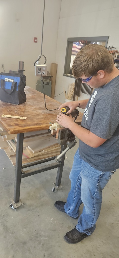 The advanced manufacturing class is working on a lamp that they designed