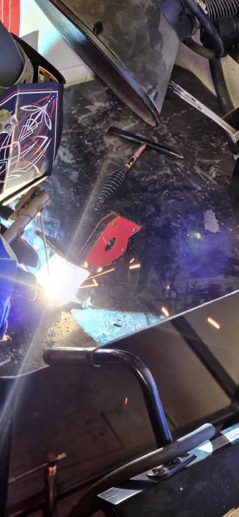 The advanced welding class working on teamwork and small (stick welding)